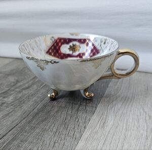 Ornate Gold-Trim Porcelain Teacup with Footed Base - White and Burgundy